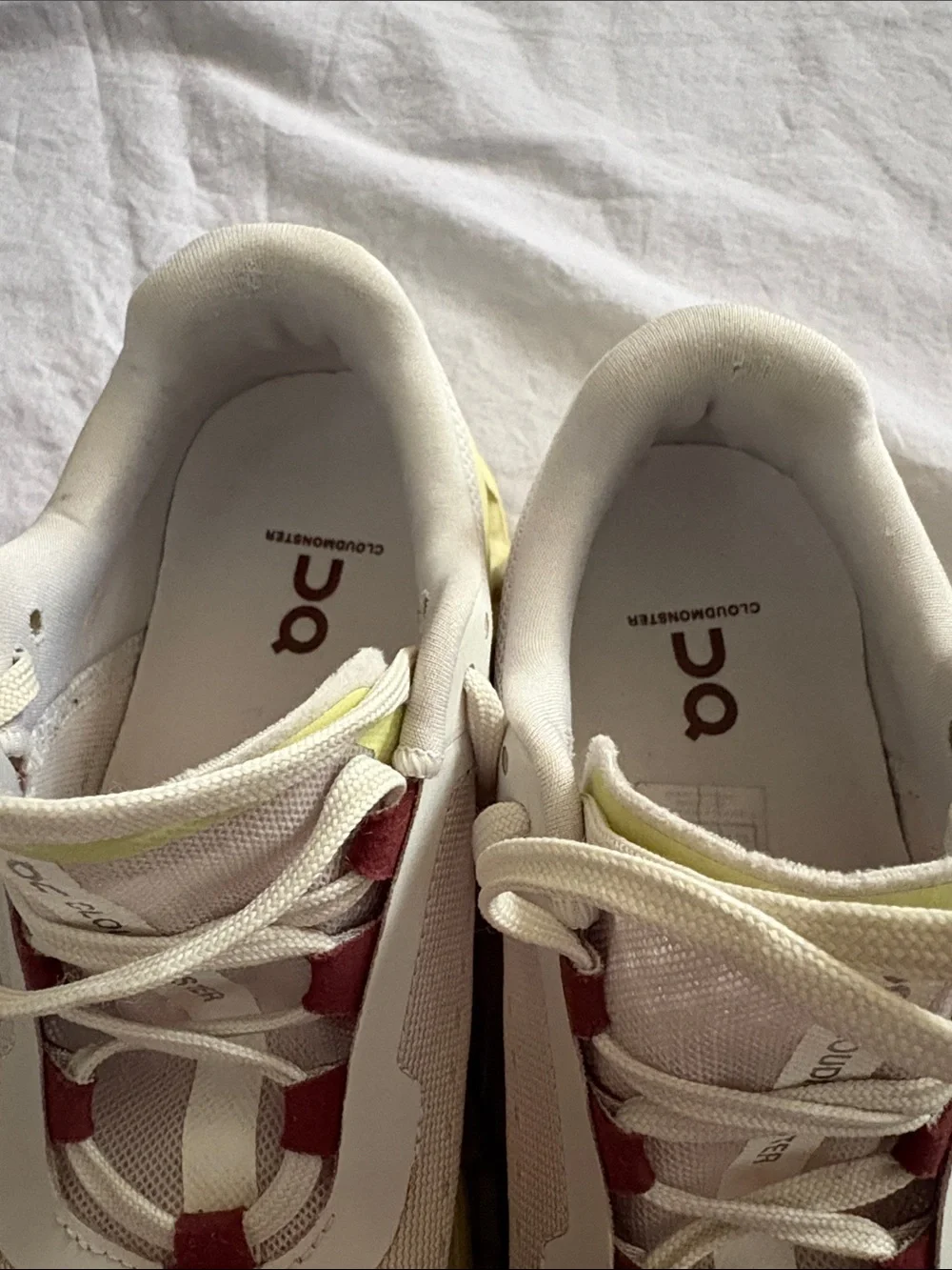 On Running Cloudmonster Sneakers in Cream with Yellow and Maroon Accents